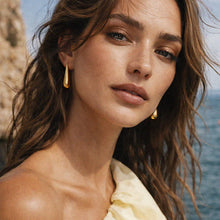 Load image into Gallery viewer, Elongated Golden Earrings